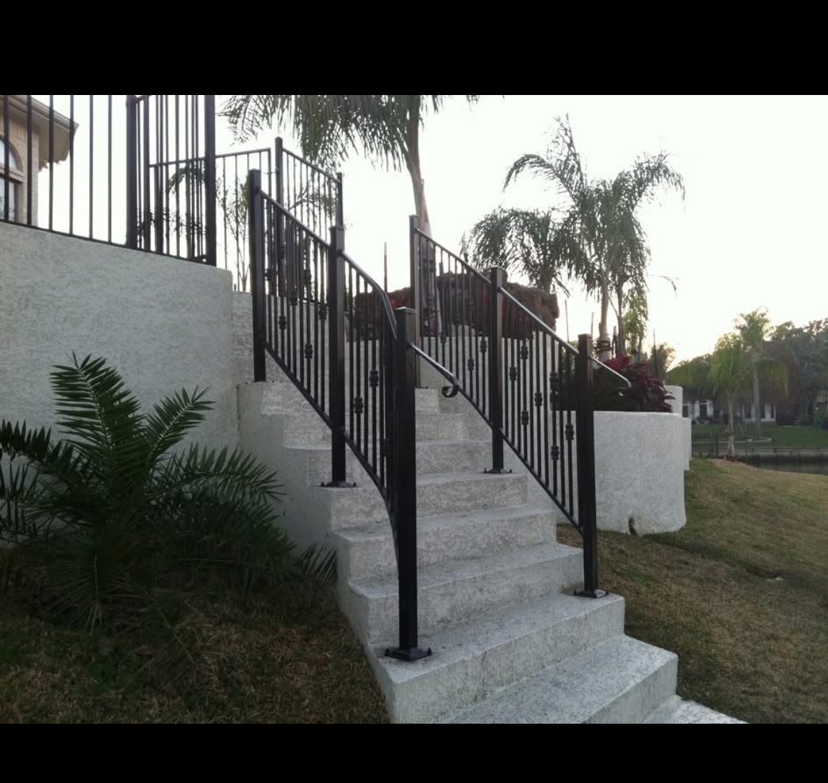 Custom black exterior steel stair railing