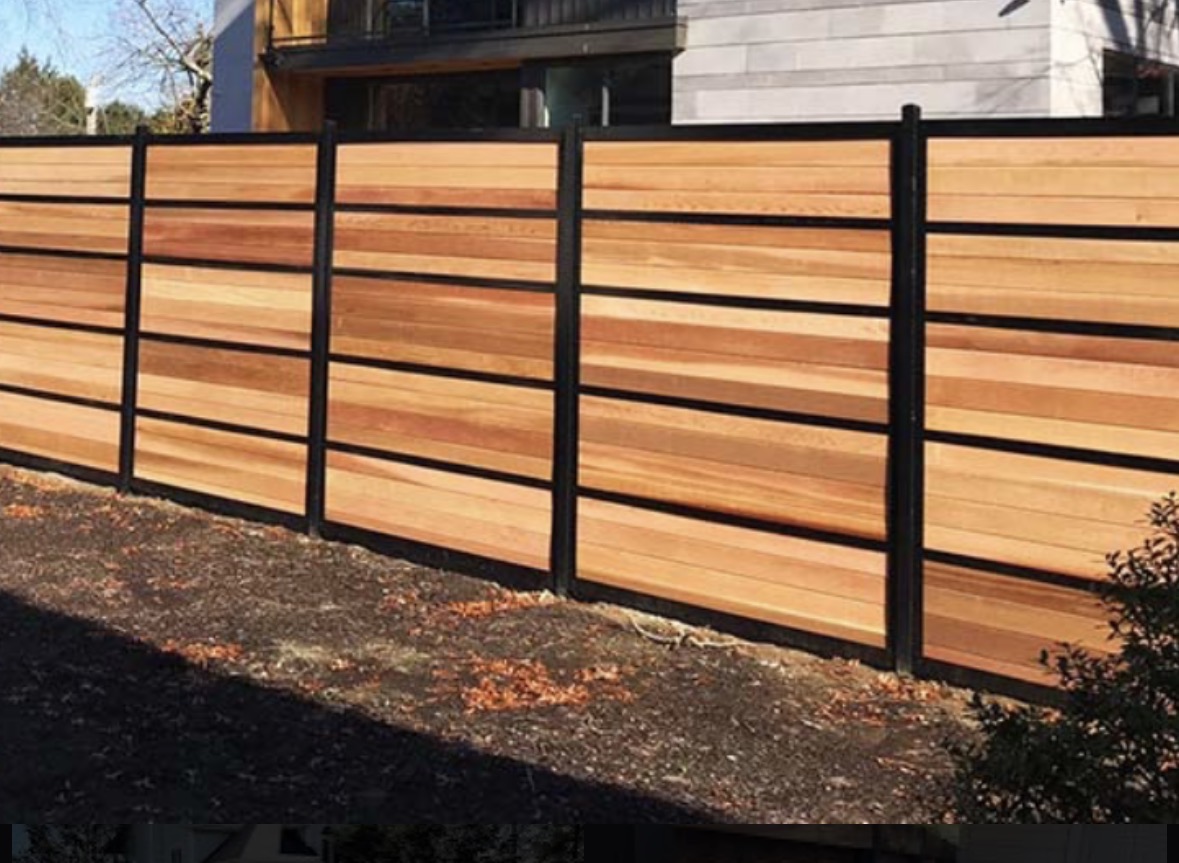 Modern steel frame fence with horizontal wood infill